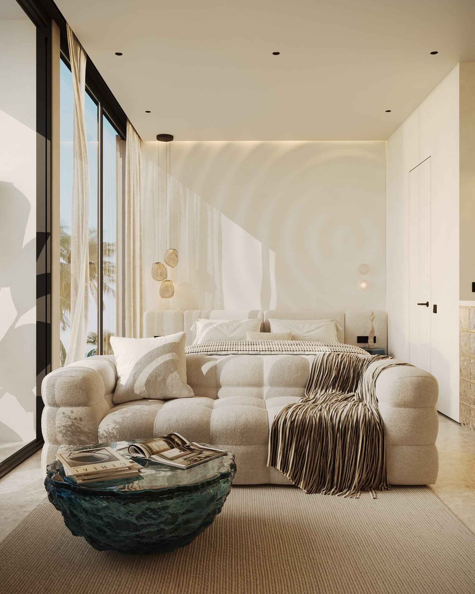 Studio residence interior with a sculpted boucle sofa, textured wall panel and warm lighting